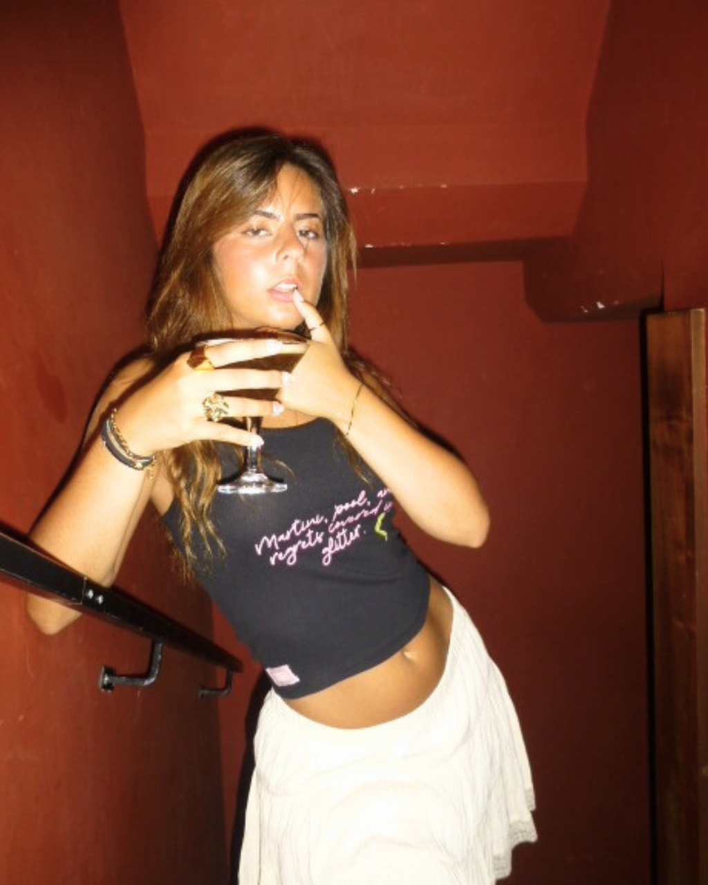 "Martini, pool, and regrets covered in glitter."